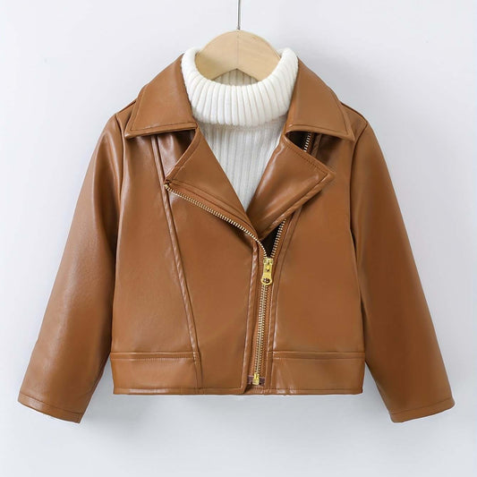 Girls' trendy brown leather jacket with modern design on hanger.