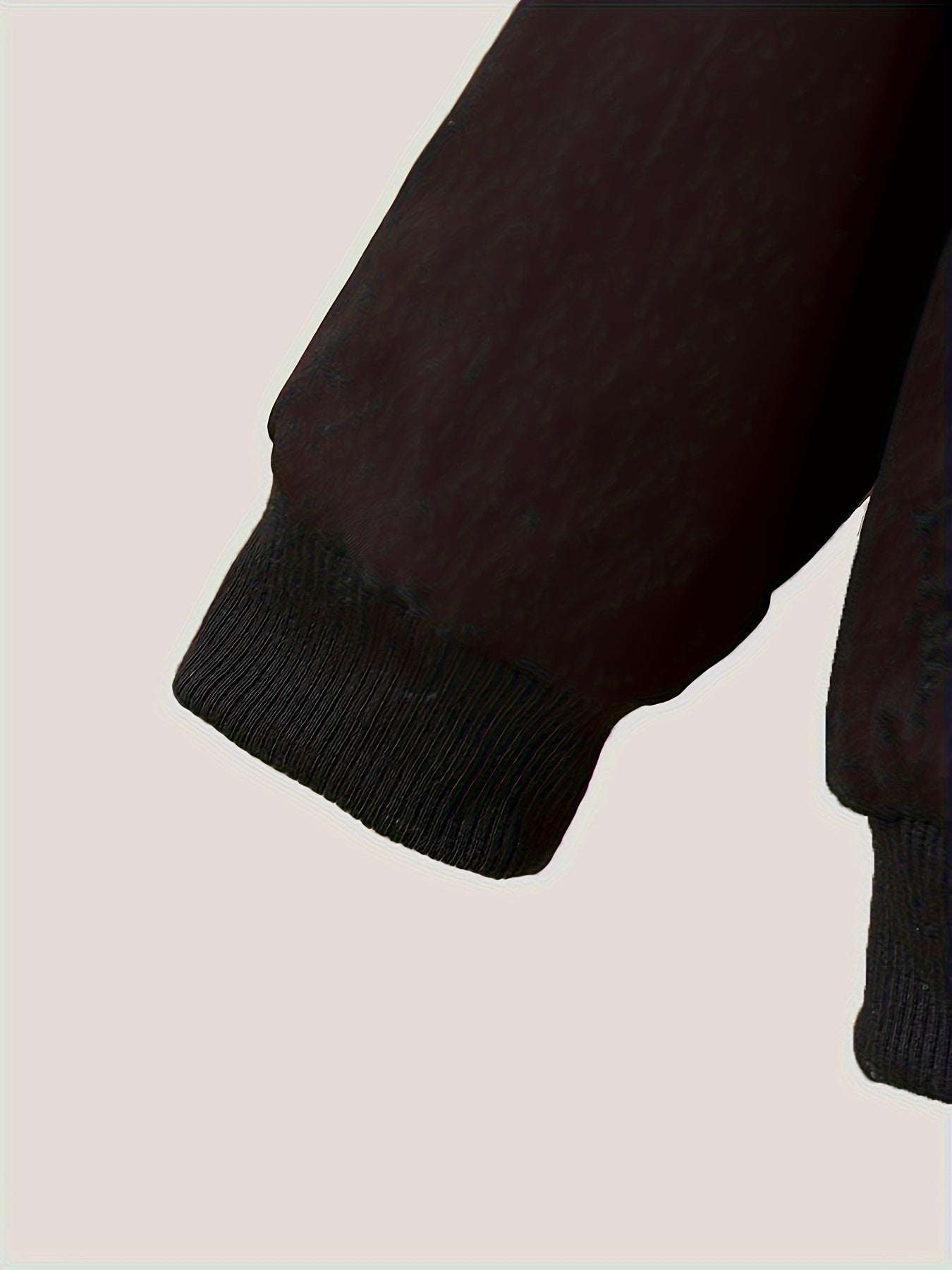Boys casual hooded jacket sleeve detail showcasing ribbed cuff.