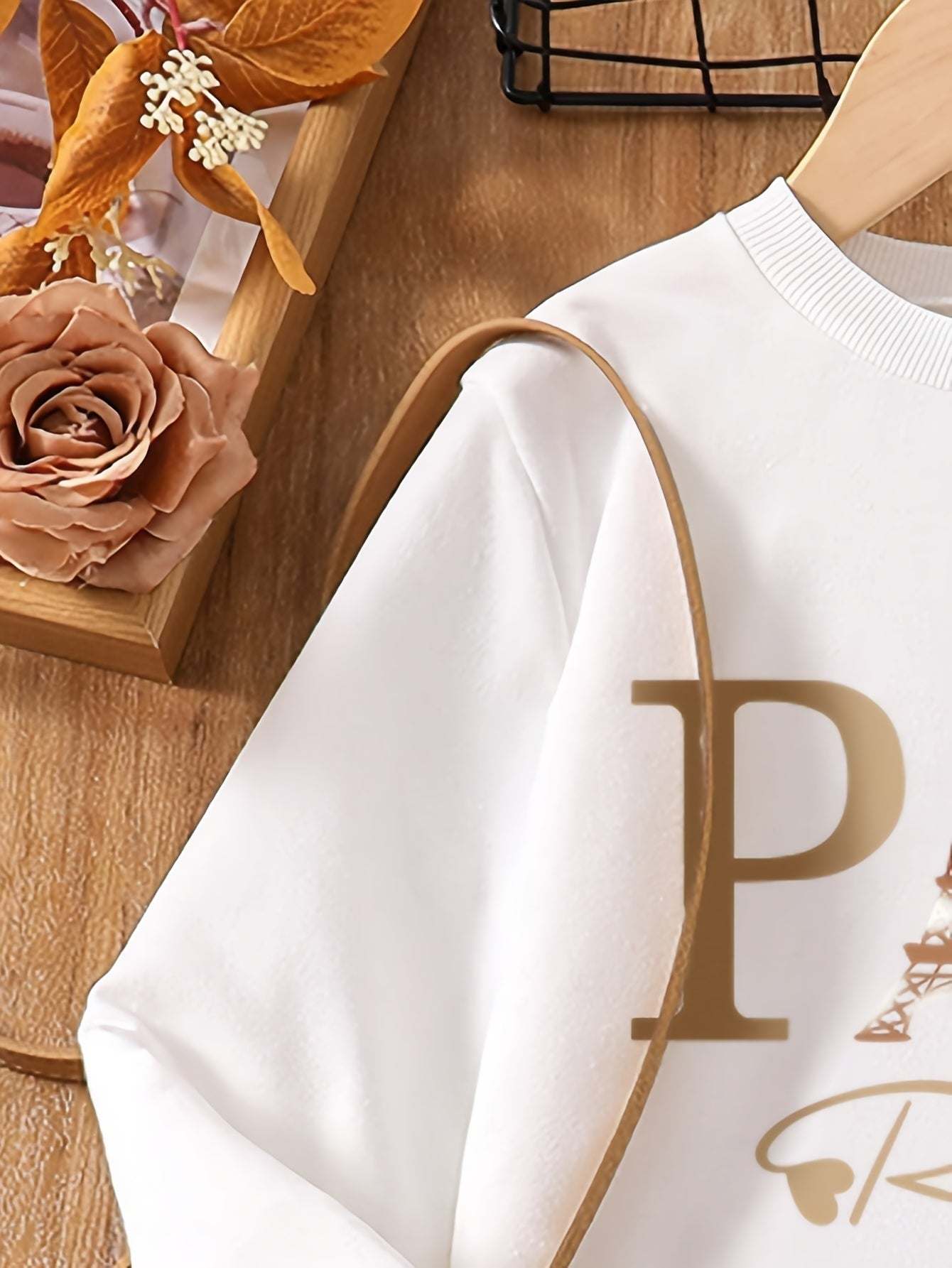 Chic girls' sweatshirt dress with Paris design, featuring cozy long sleeves and classic crew neck.