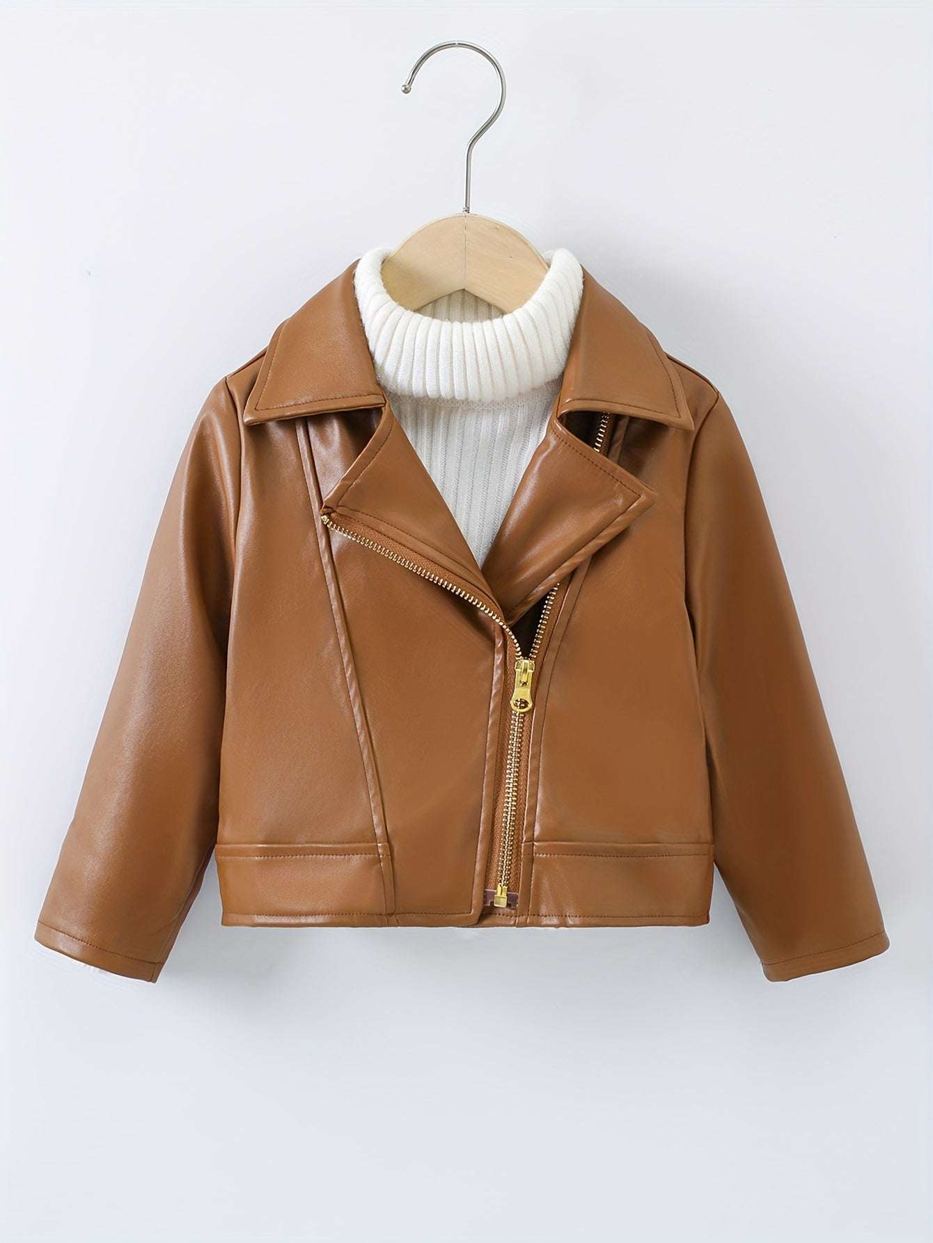 Trendy girls' brown leather jacket with modern design.