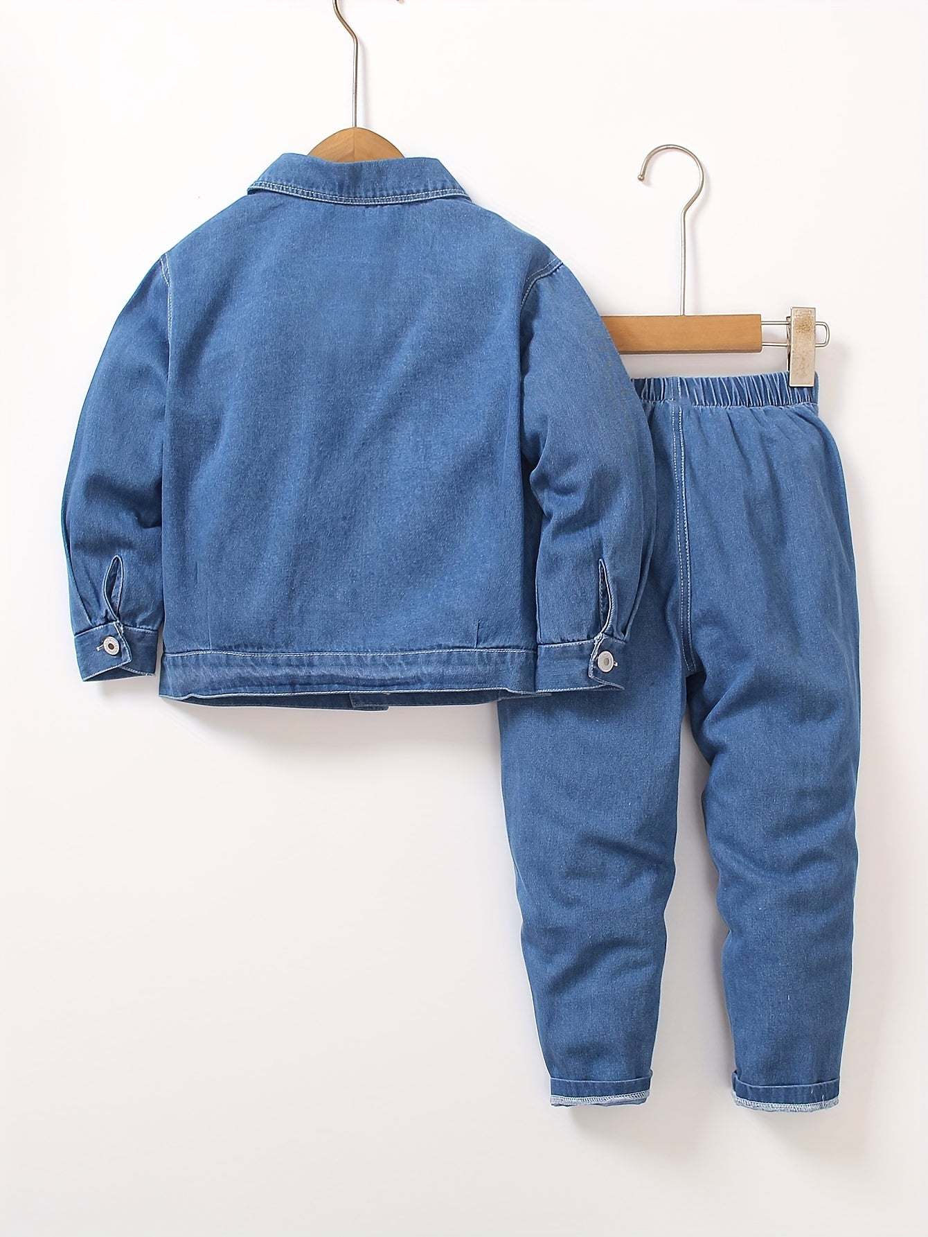 Cool boys' denim outfit set on hanger.