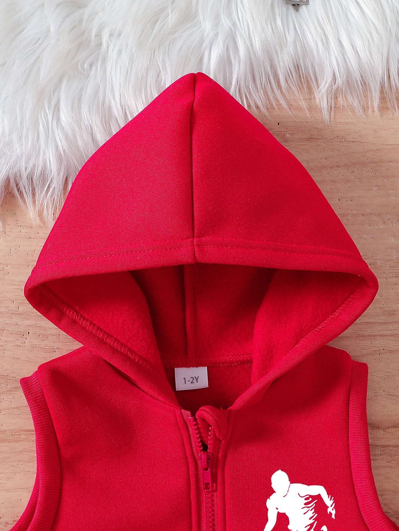 Red hoodie with soccer player design, part of a sporty three-piece boys' set.