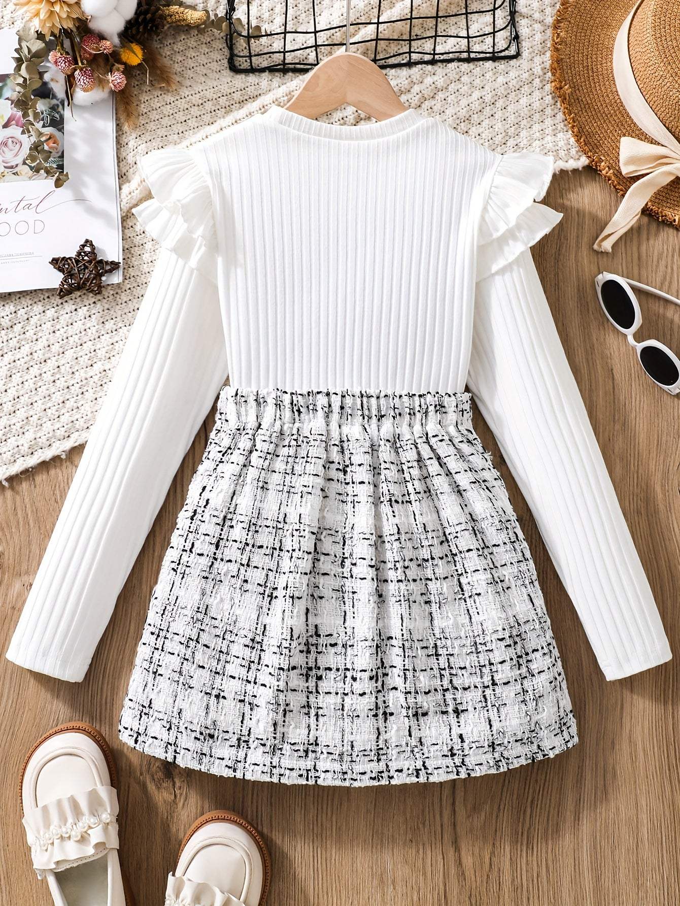 2-piece set flounce trim long sleeve top with tweed knit skirt, flatlay on wooden surface with accessories.