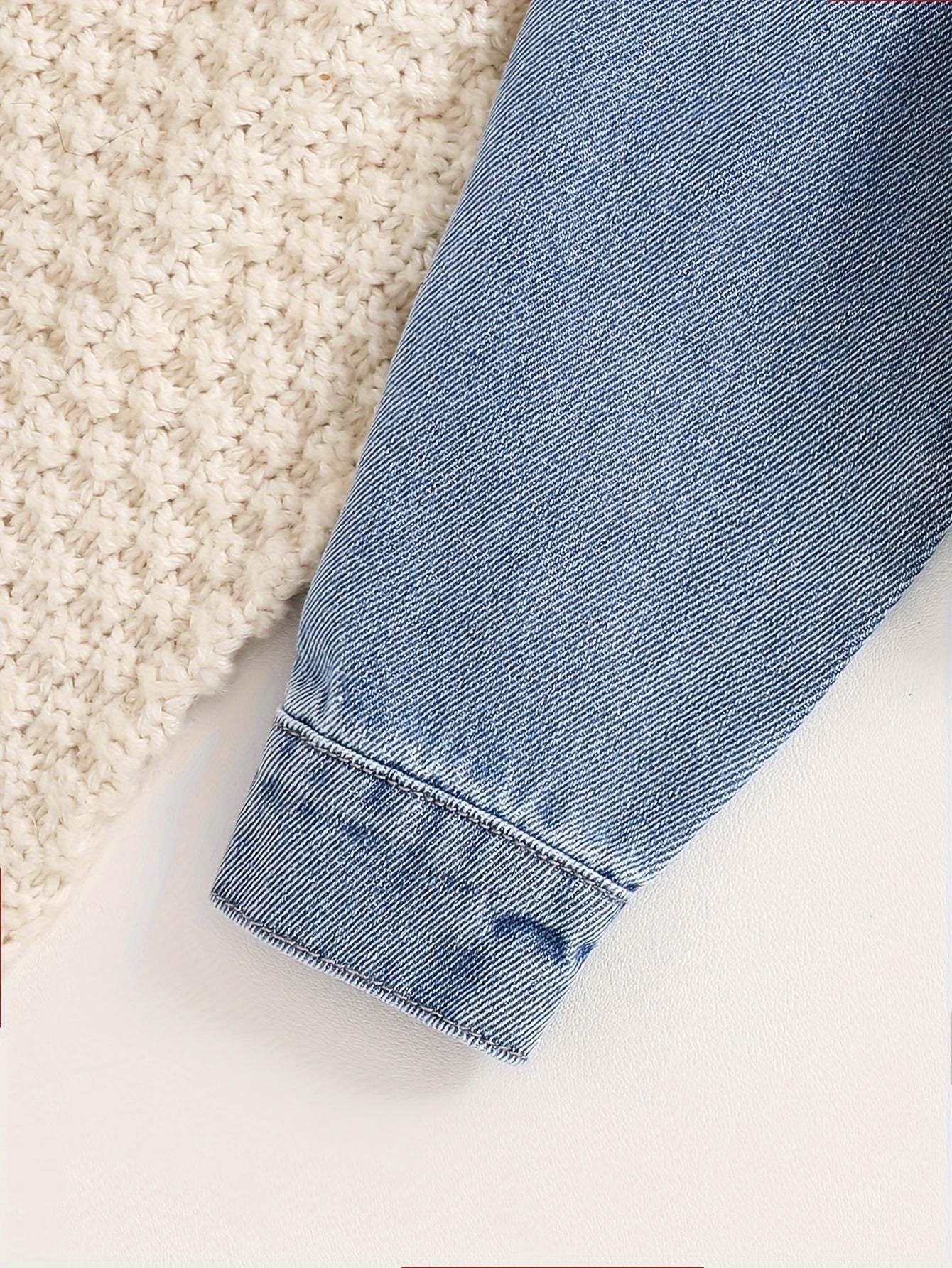 Sleeve detail of a fashionable denim jacket for girls, perfect for every season.