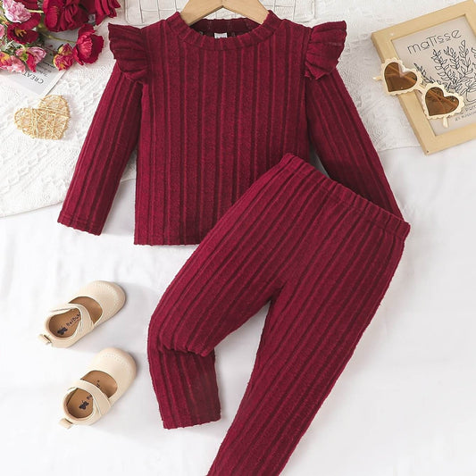 Stylish multicolor girls' outfit set with ruffle details and crew neck top.