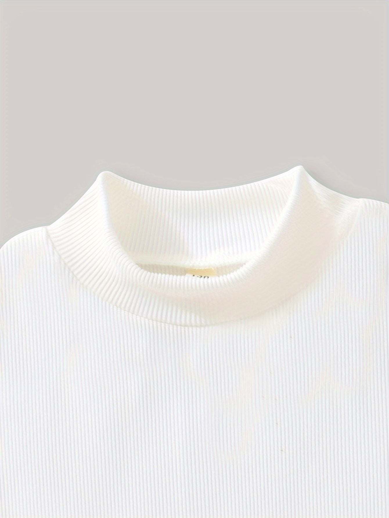 Close-up of an elegant long-sleeved, high-neck design in white, part of the fashionable two-piece dress collection.