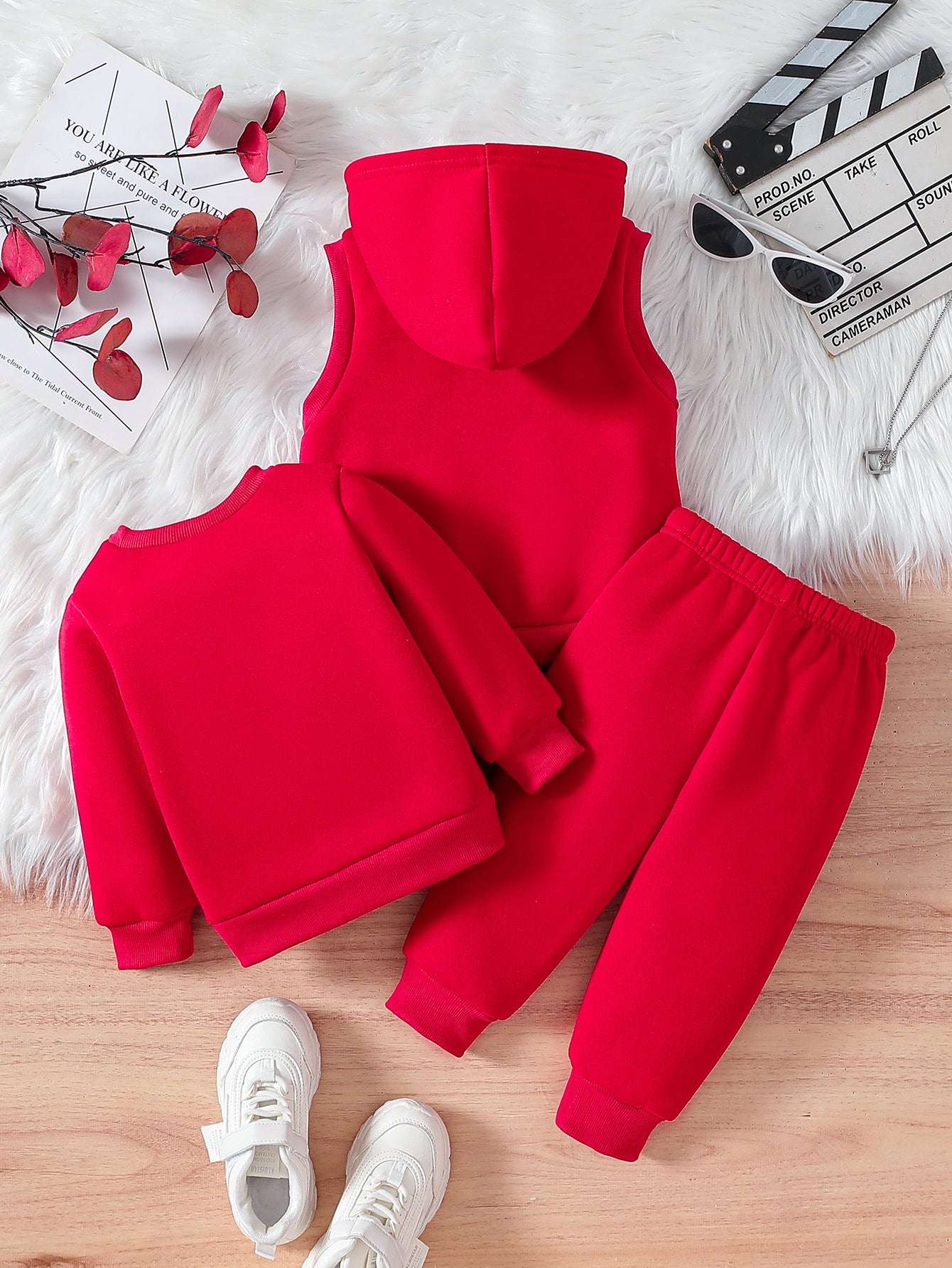 Sporty three-piece boys' set with a cool soccer player design in vibrant red.