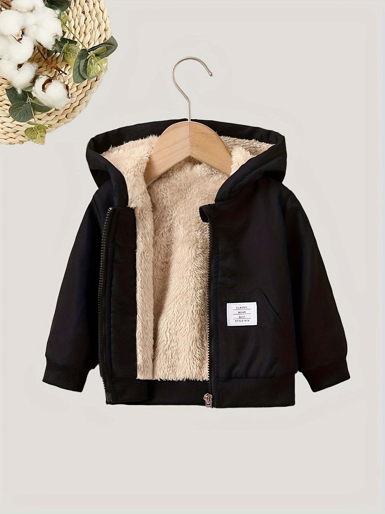 Boys casual hooded jacket with stylish design and cozy lining.