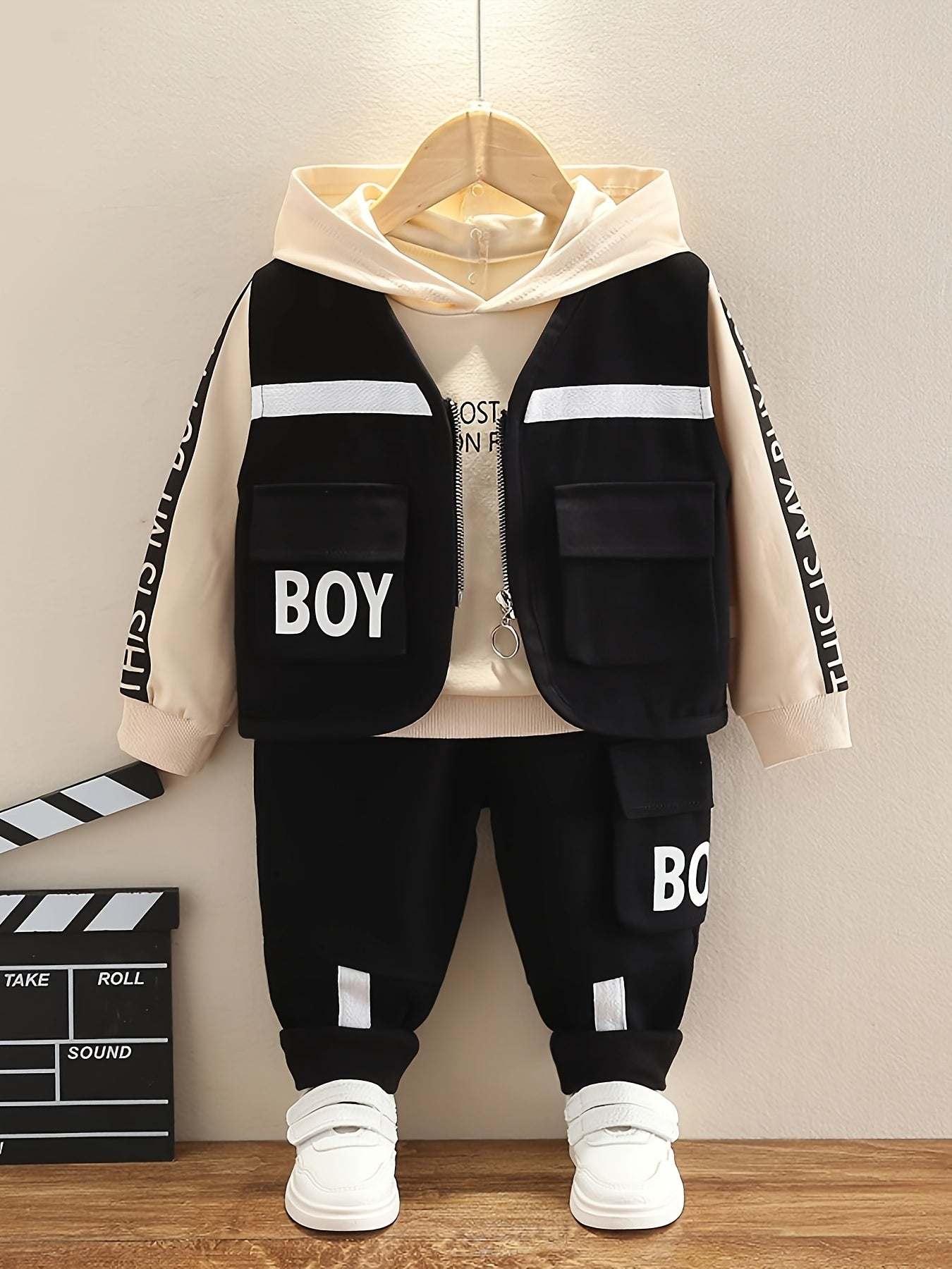 Trendy boys' three-piece set with bold 'Boy' design, featuring high-quality cotton and comfortable fit.