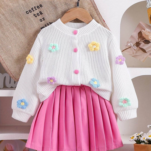 Adorable girls' outfit set with cute pink skirt and floral top, perfect for fall.