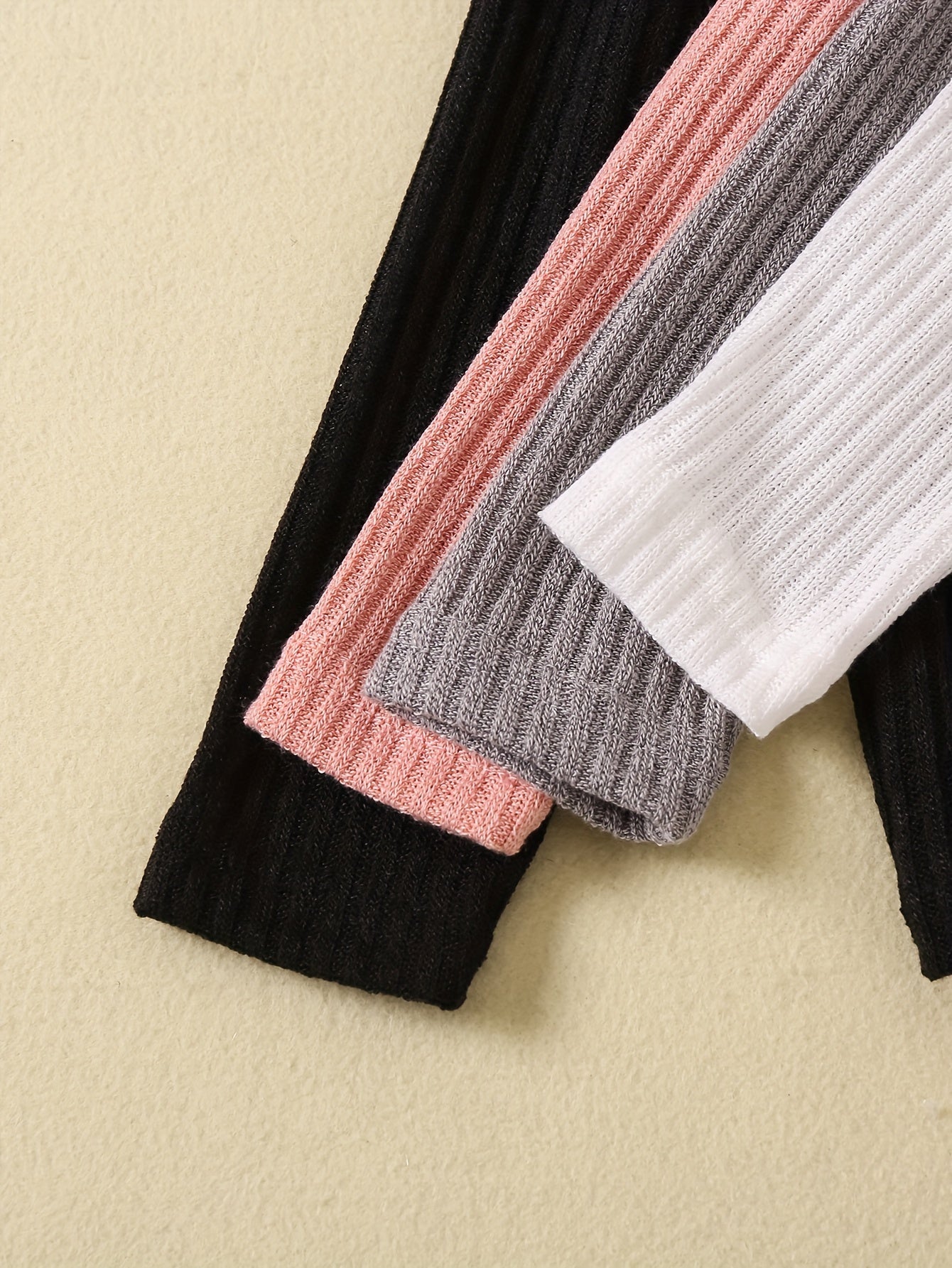 4pcs Girls Stretchy Turtleneck Set for All Seasons showcases versatile styles in pink, gray, black, and white.