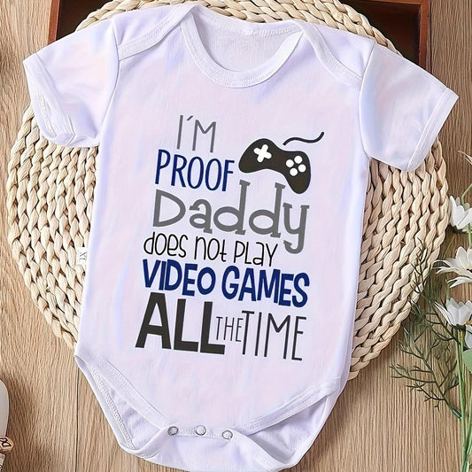 Romper for infants with the phrase "I'm Proof Daddy Does Not Play Video Games All the Time"; lightweight polyester fabric.