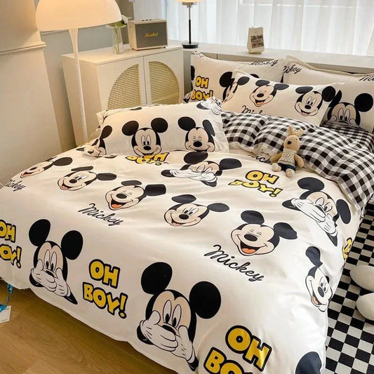 Disney 4-piece cotton bedding set with cartoon design featuring iconic characters, creating a playful and cozy bedroom atmosphere.