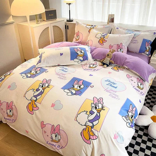 Disney 4-piece cotton bedding set with playful cartoon design, featuring duvet cover, pillowcases, and flat sheet.