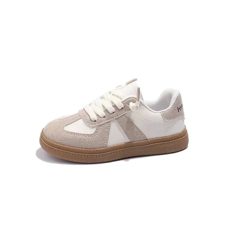 Trendy unisex sneakers for kids with white and beige design, providing all-day comfort and durability.
