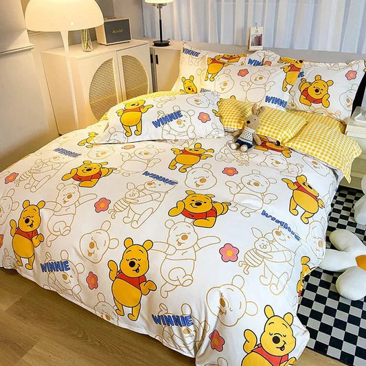 Disney 4-piece cotton bedding set with playful cartoon design featuring Winnie the Pooh.