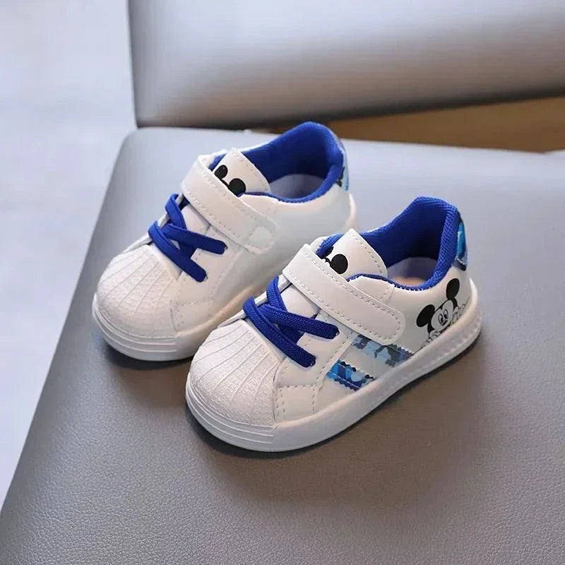 Disney white casual shoes for kids with Mickey Mouse design, featuring anti-slip and comfortable EVA insole for magical moments.