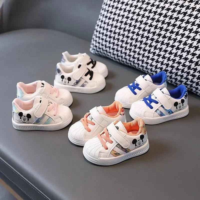 Magical Moments Disney white casual shoes for kids with colorful accents and anti-slip design.