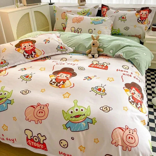 Disney 4-piece cotton bedding set with playful cartoon design, featuring duvet cover, pillowcases, and flat sheet.