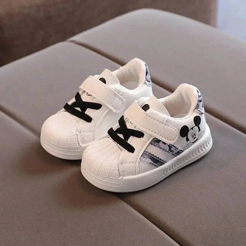 Disney white casual shoes for kids, featuring Mickey Mouse design and anti-slip soles.