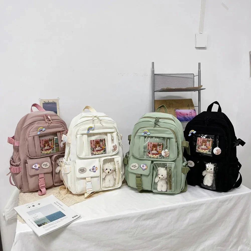 Schoolbags for children in assorted colors with anti-slip design and unisex style on display.