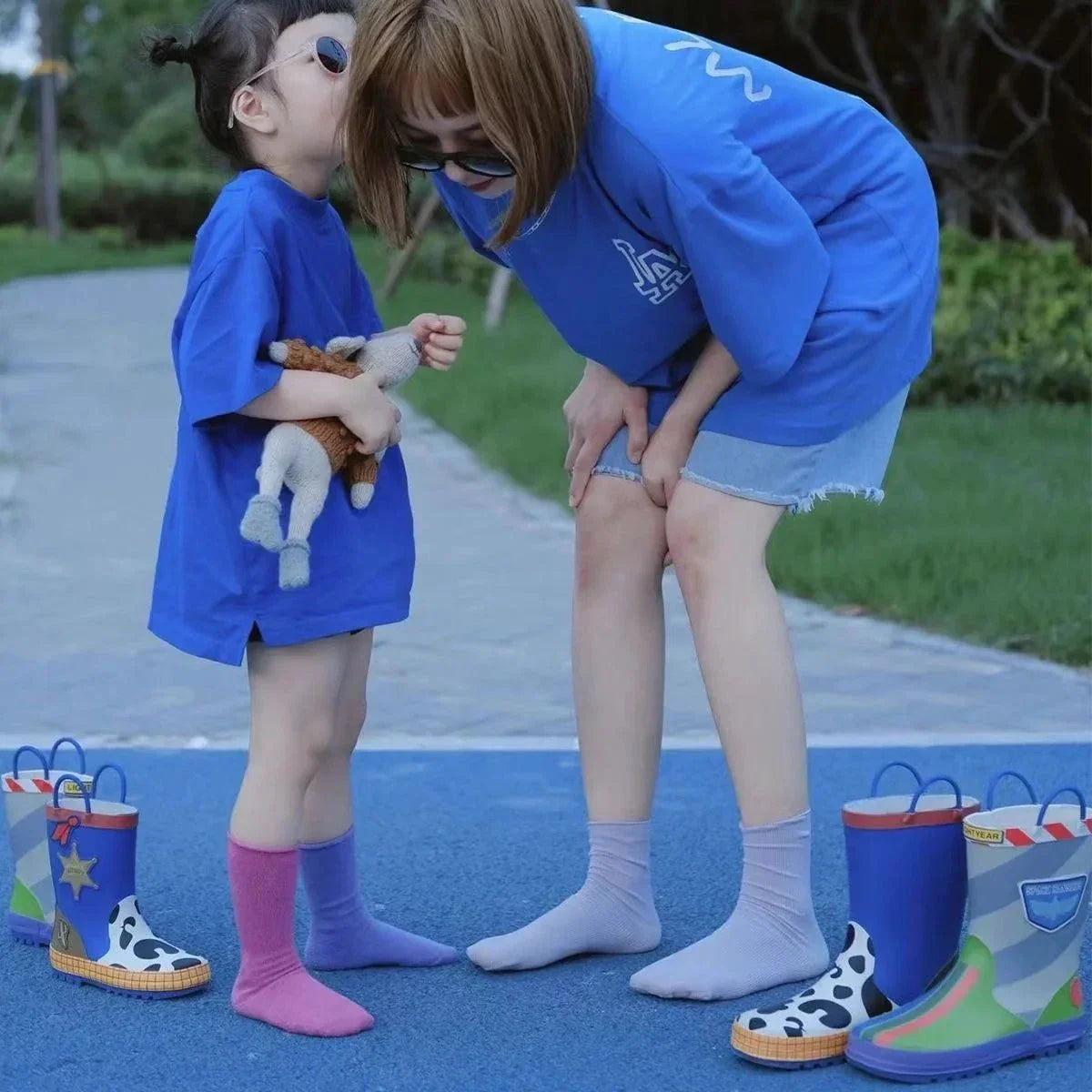 Adventure awaits boots for kids featuring Disney cartoon designs on a colorful background, perfect for imaginative play.