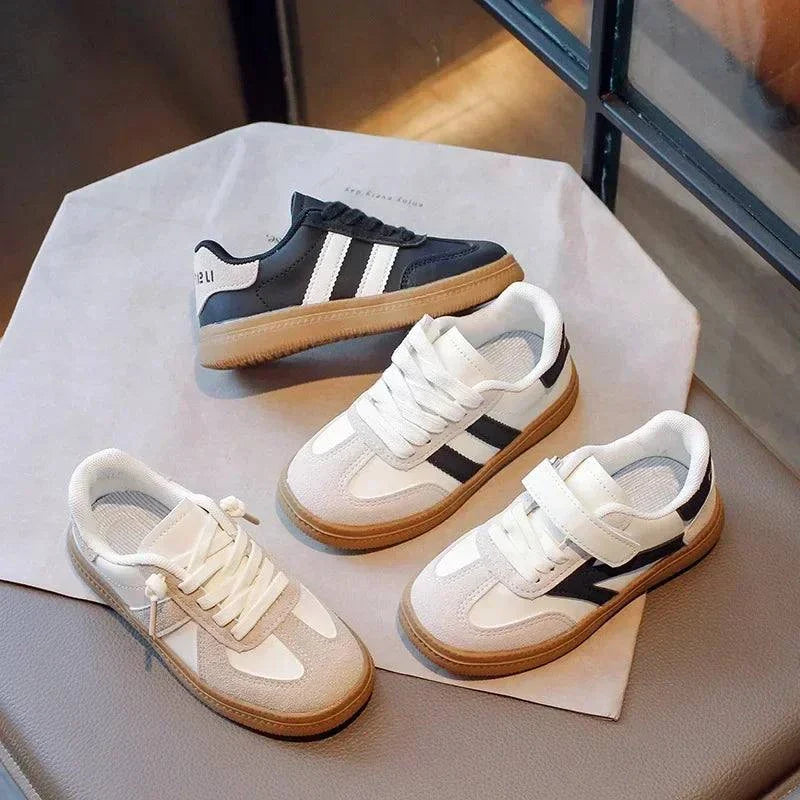 Trendy unisex sneakers for kids with all-day comfort and durable PU leather.