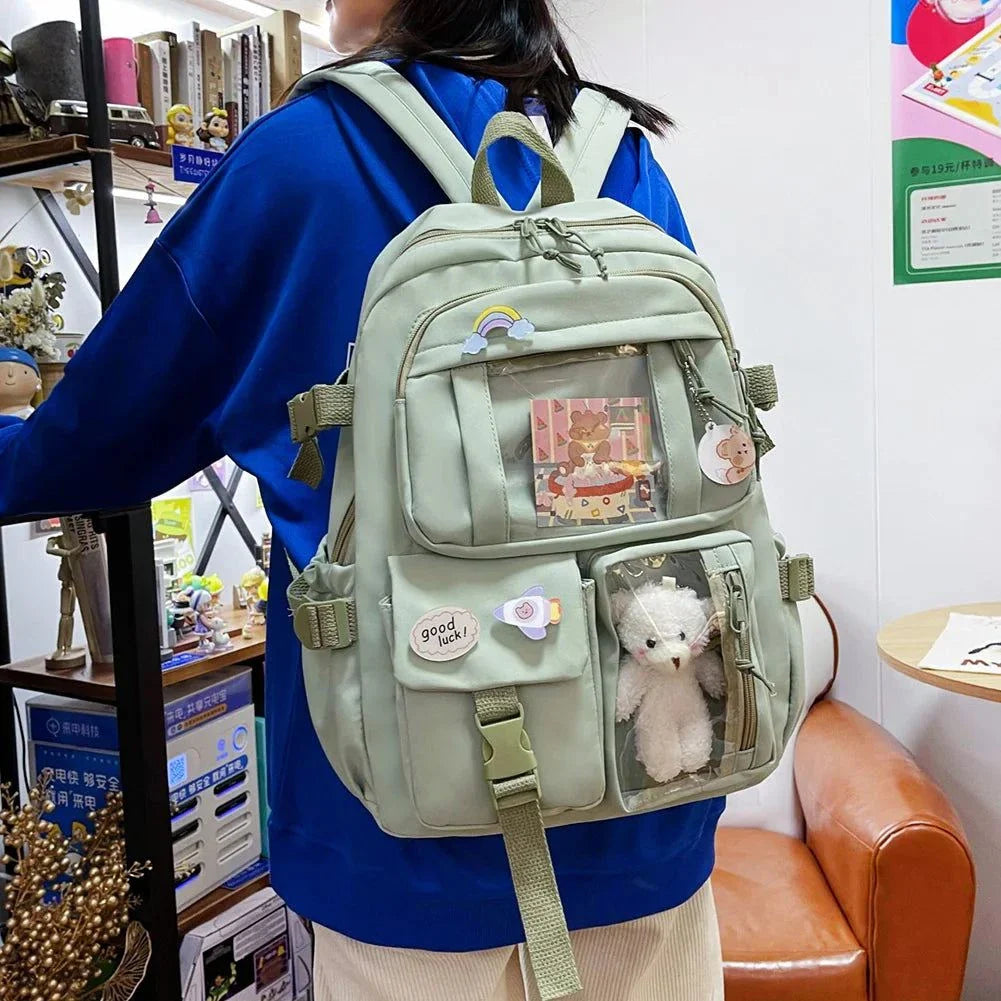 Stylish green children's schoolbag with multiple compartments, anti-slip design, and unisex appeal.