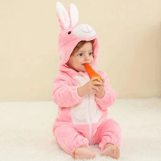 Baby in a pink bunny jumpsuit.
