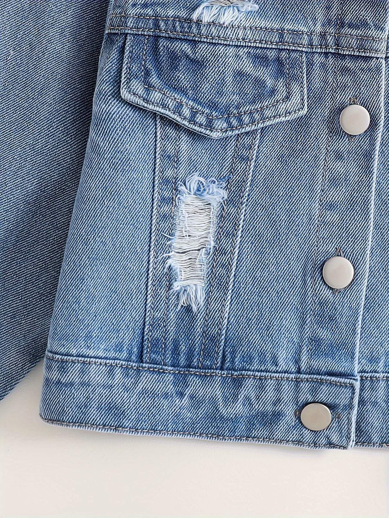 Close-up of a fashionable girls' denim jacket with button details.