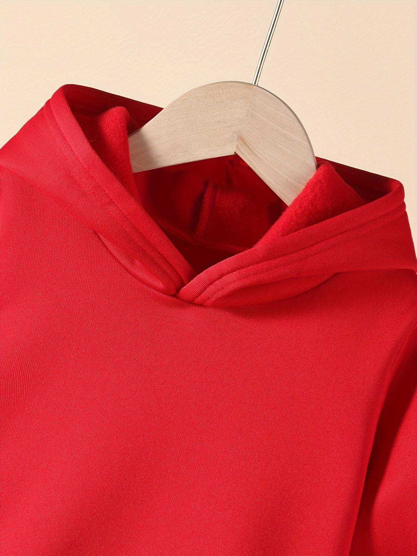 Stylish boys' Milano set hoodie in vibrant red, showcasing modern design and high-quality polyester for comfort and durability.