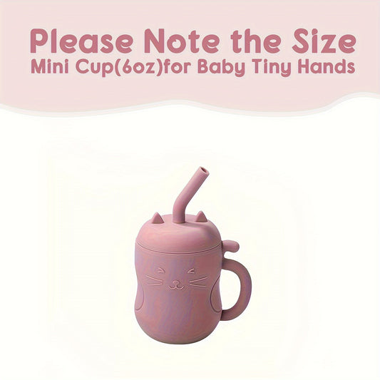 Kawaii cat learning cup for babies with straw and handle, pink color.
