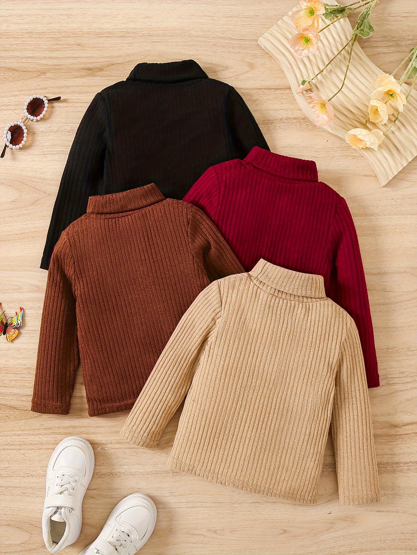 Four stylish tops from the 4pcs Girls Stretchy Turtleneck Set for All Seasons, perfect for versatile year-round wear.