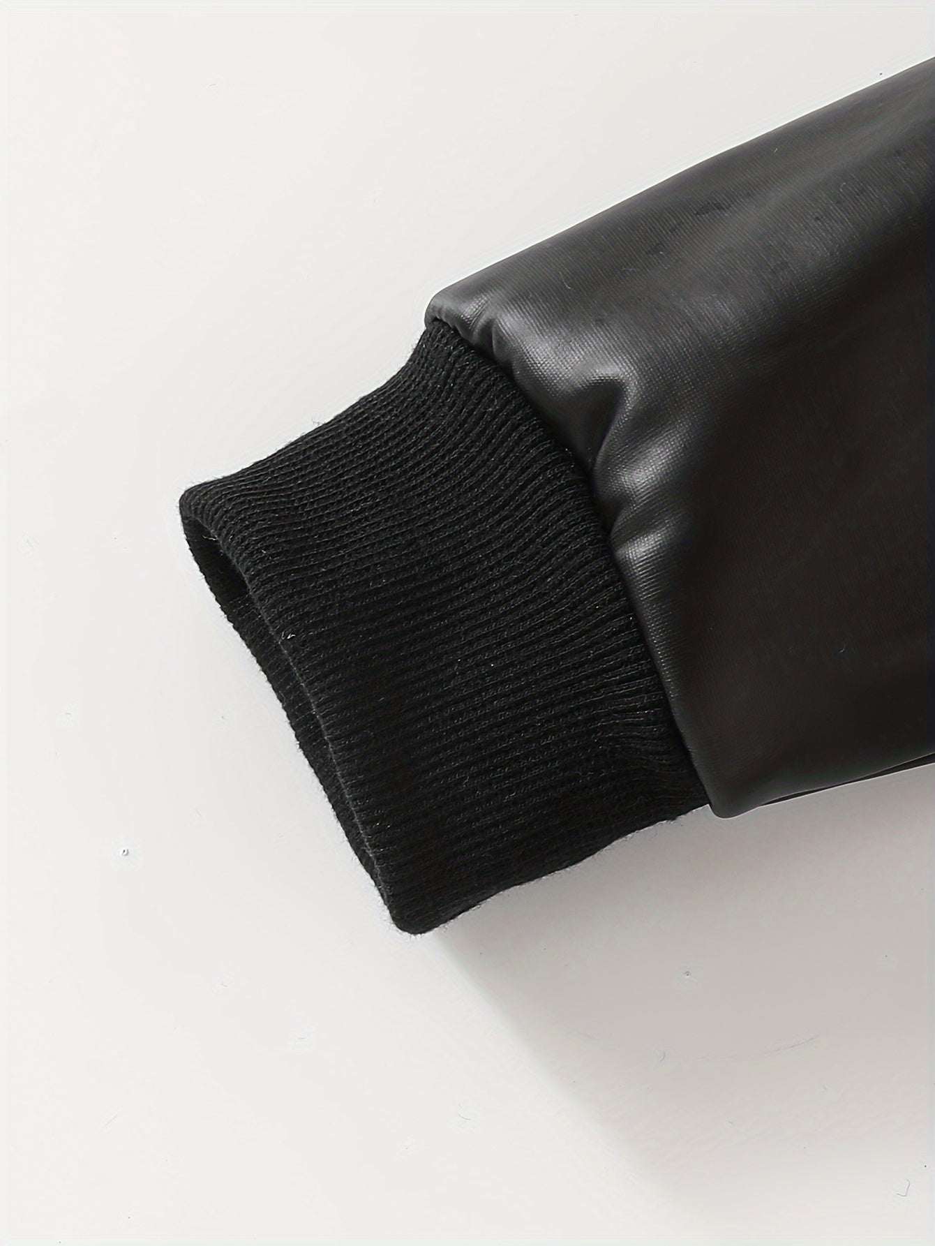 Classic leather jacket sleeve for boys, stylish and durable design.