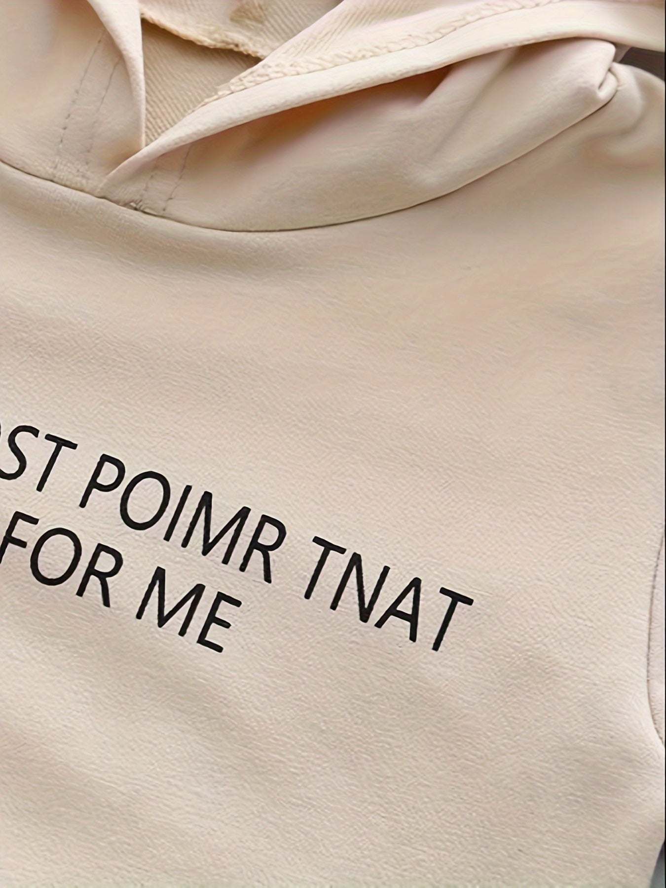 Trendy boys' hooded top with bold text in beige cotton fabric.