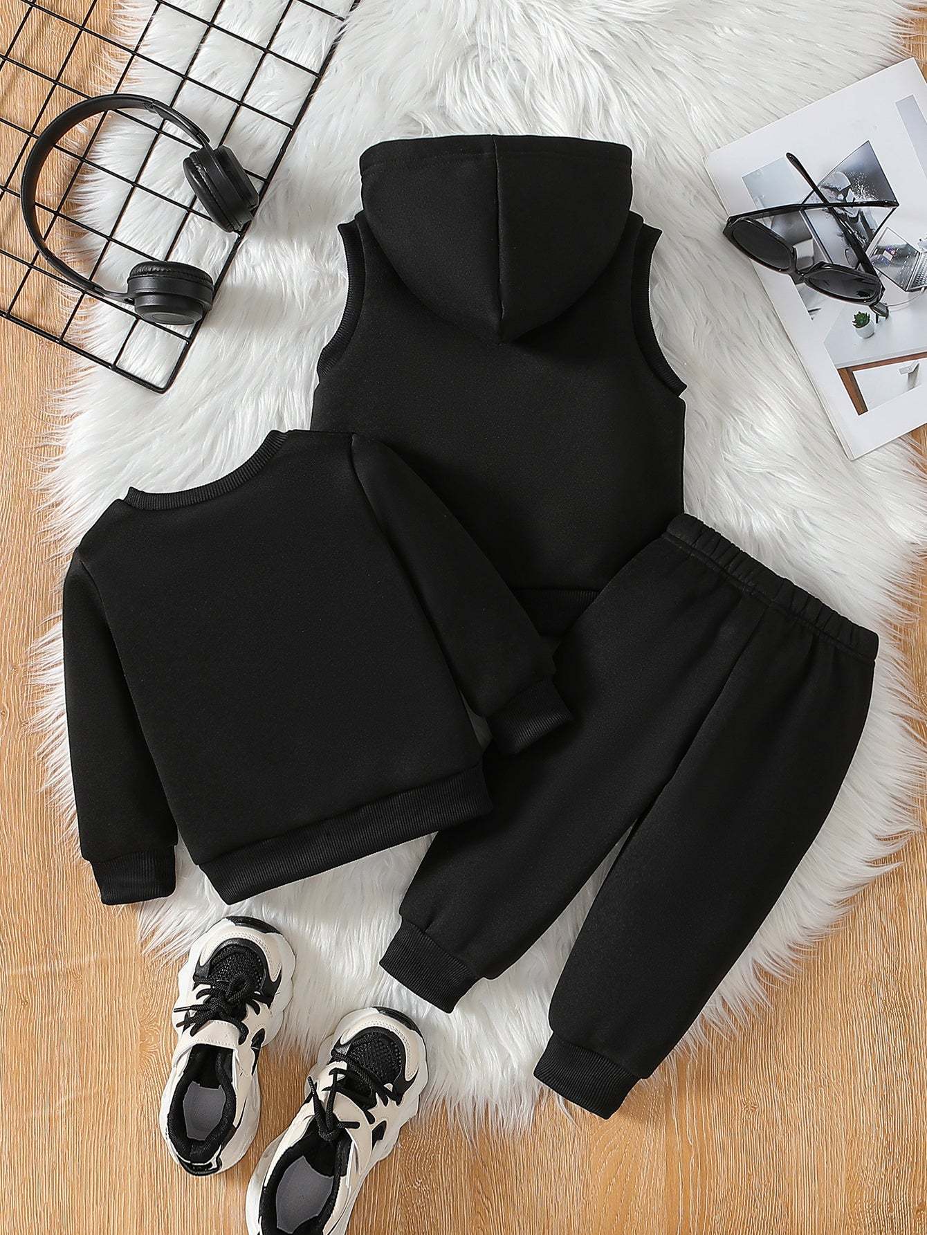 Sporty three-piece set for boys with soccer player design, featuring a comfortable fit and versatile style, ideal for young sports enthusiasts.
