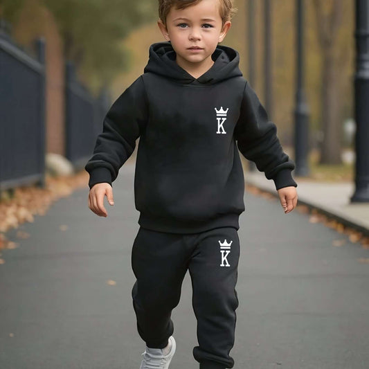 Boys' black hoodie and pants set with king logo, perfect for autumn sports activities.