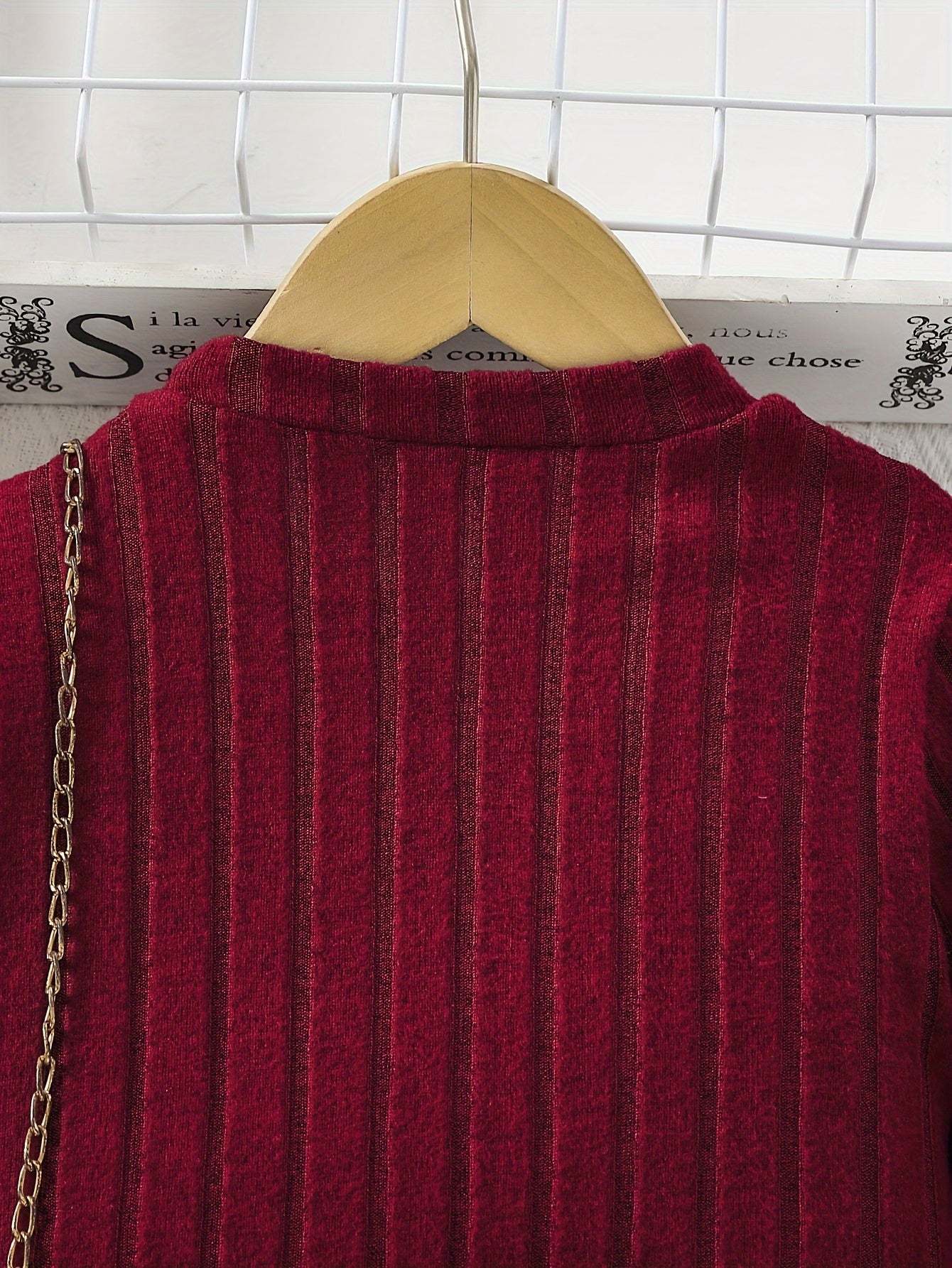 Luxurious fine knit red girls' outfit, stylish and minimalist design.