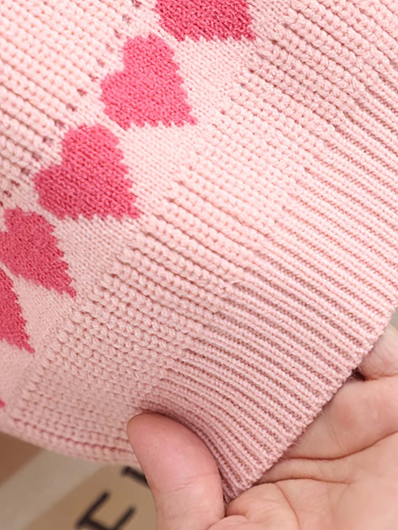 Adorable heart-patterned kids' set in soft pink cotton with red hearts.