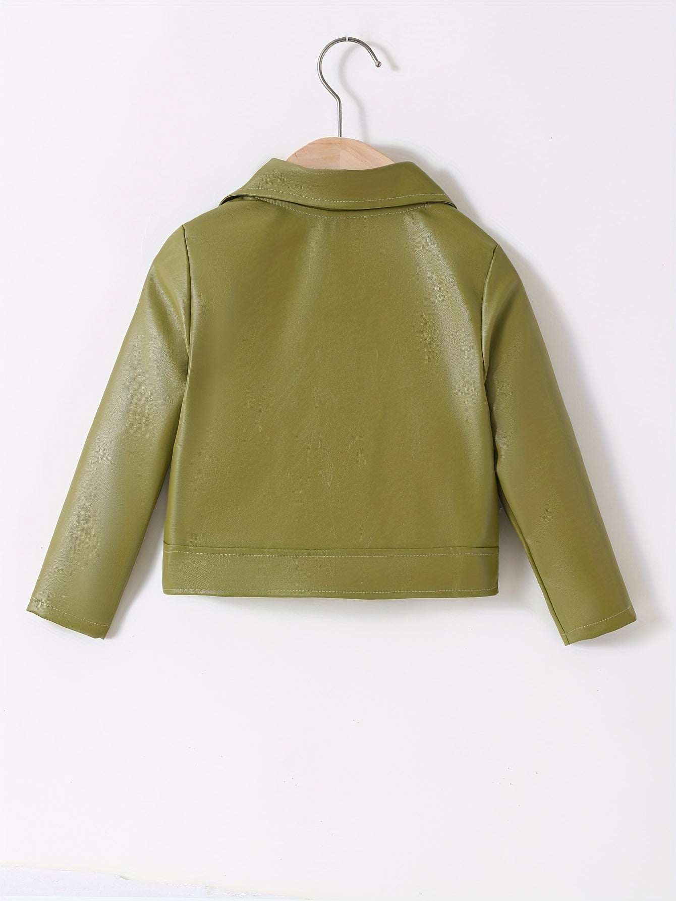 Green kids' leather jacket on hanger, viewed from the back.