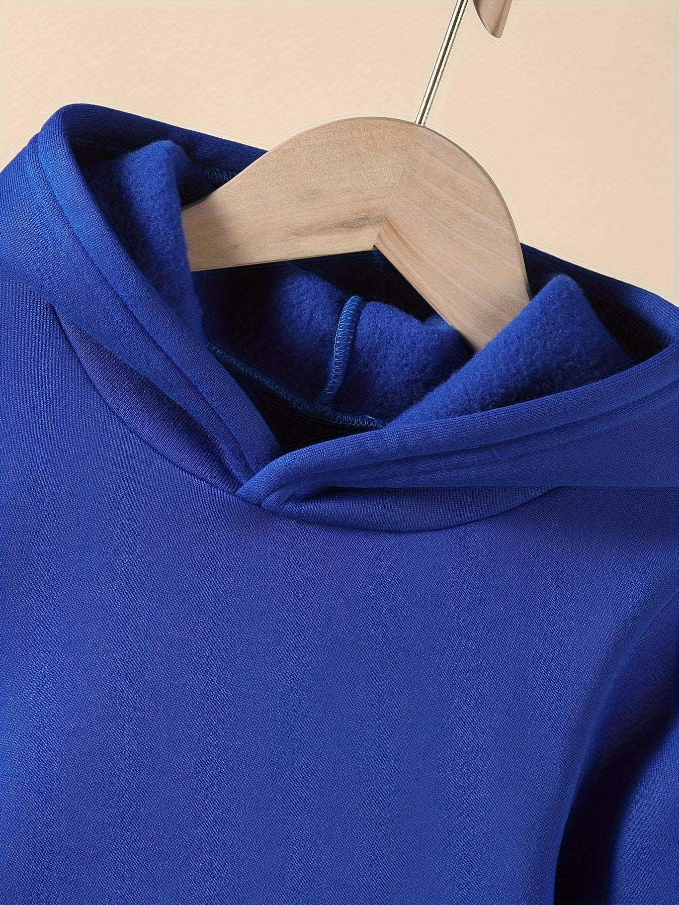 Stylish boys' Milano set in vibrant blue fabric, showcasing high-quality materials and trendy design.