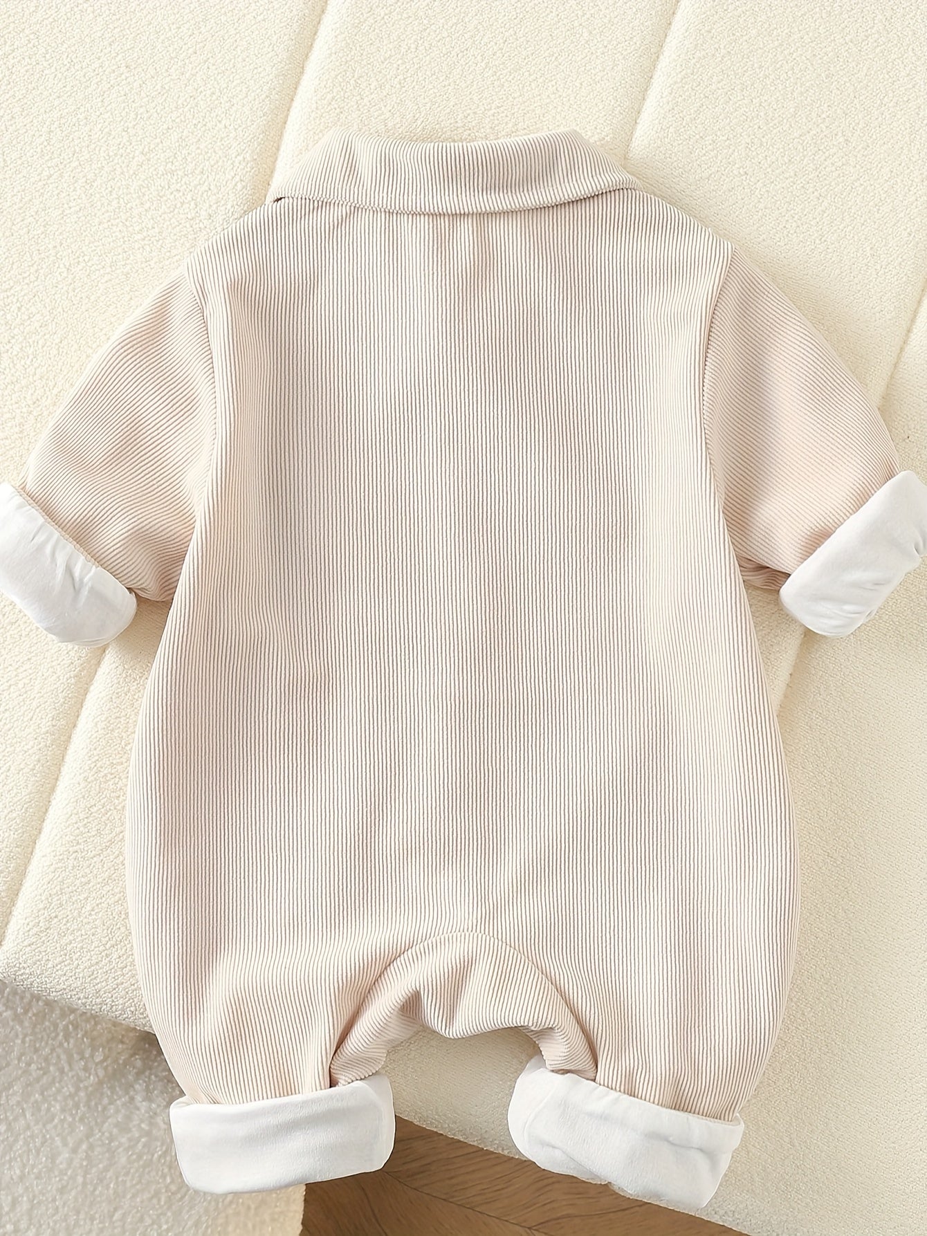 Snug As A Bug Romper With Playful Baby Pocket Design