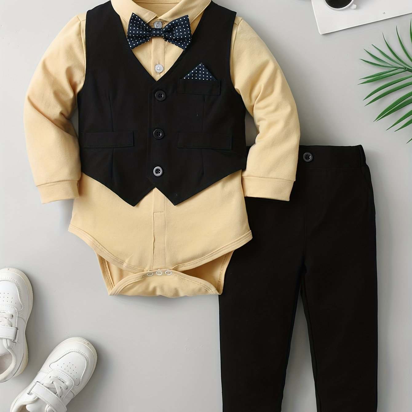 Dapper Gentleman 3-Piece Suit Set for Boys with vest, shirt, and pants, perfect for stylish events.