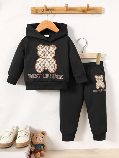 Playful Paws Cozy Bear Print Sweatshirt and Pants Set for kids with cheerful design, in black, on wooden hangers.