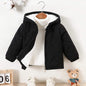 Chic velvet hooded jacket for infants, perfect for trendy layering and warmth.