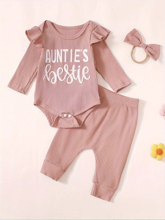 Cute baby outfit set with "Auntie's Bestie" print, perfect for showcasing best friend vibes; includes a top, pants, and matching headband in soft pink cotton.