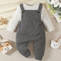 Classic combo kids' overall and shirt set with buttons, grey and white, on soft textured background.