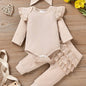 Charming Trio 3-piece outfit set with headband for girls, featuring ruffled long-sleeve top and matching pants, crafted from cotton blend for comfort.