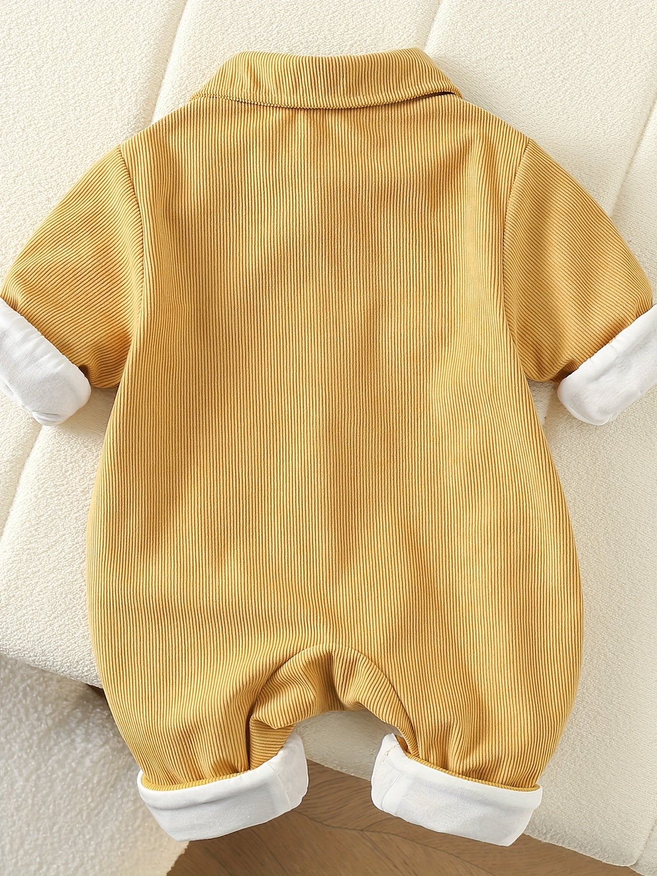 Snug As A Bug Romper With Playful Baby Pocket Design