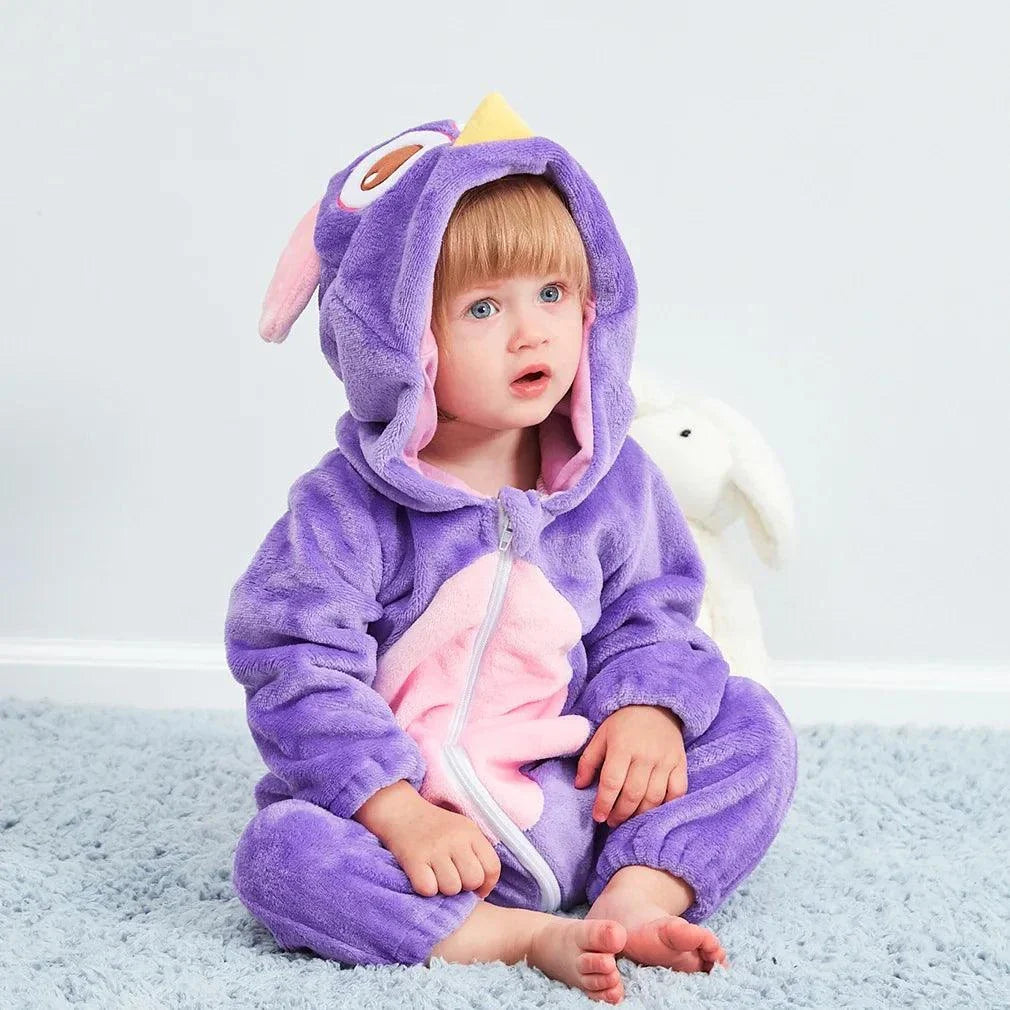 Adorable baby in purple penguin-themed jumpsuit, perfect for New Children's Day celebrations.